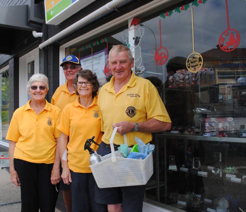 CHRISTMAS ELVES: Cheryl and Ron Schultz, Fran Wicks and Allan McDonald decorated a number of shopfronts in Ulladulla on Wednesday, November 20.