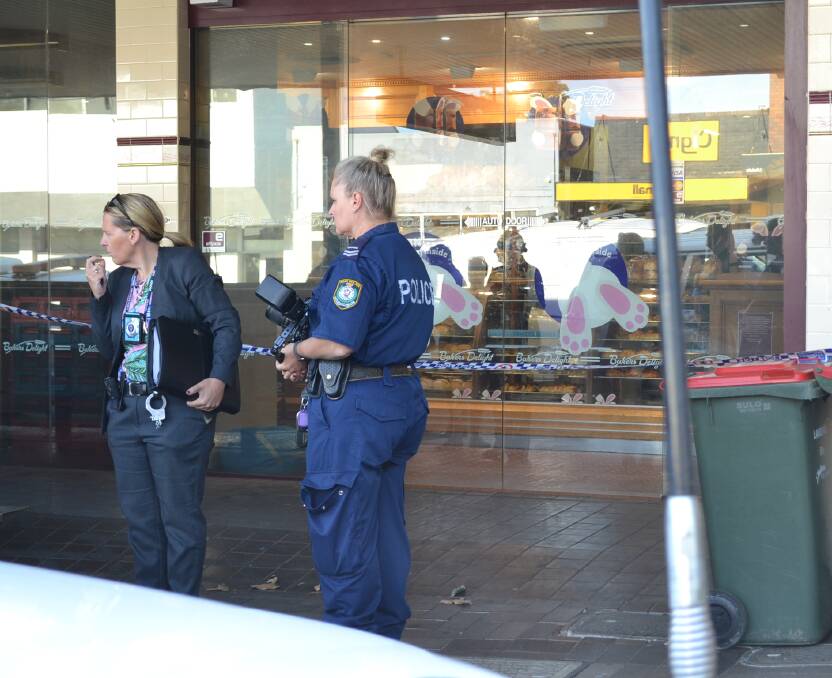 South Coast Police District detectives and crime scene officers investigate an alleged armed robbery at Bakers Delight, Ulladulla early Tuesday, February 26. 