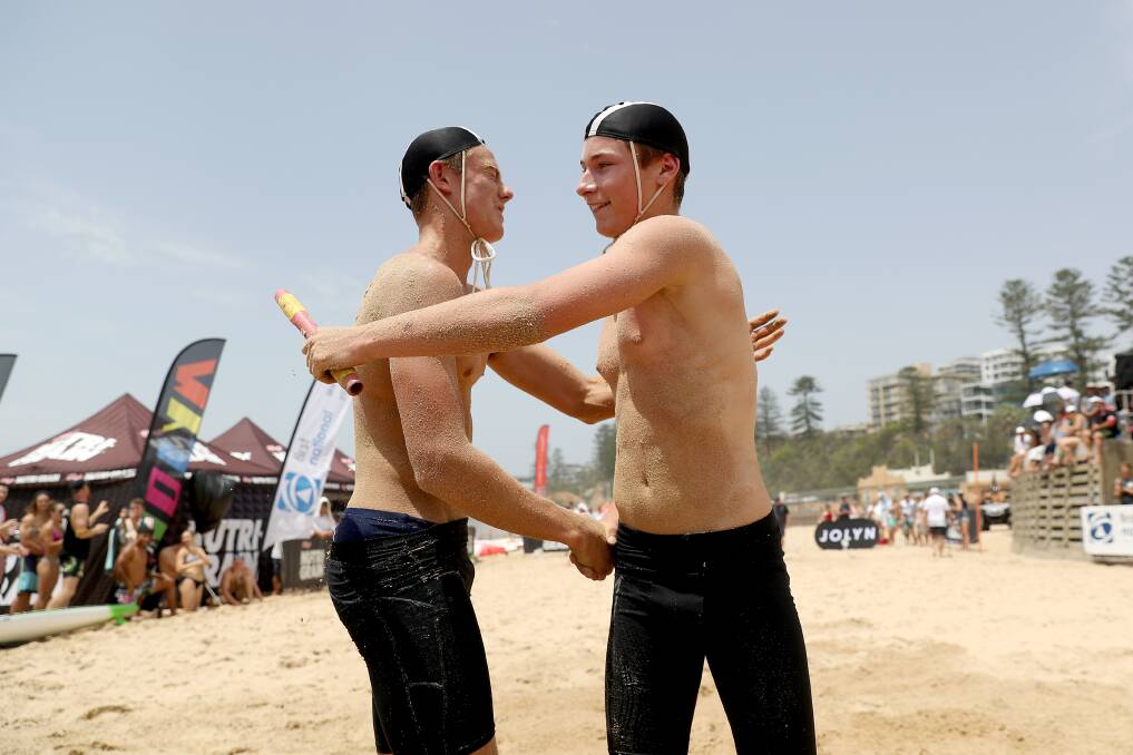 QUICK STEP: Mollymook Surf Life Saving Club's Brock Scrivener and Sam Zustovich congratulate each other after their duel at North Wollongong in round three. Picture: Shane Myers.