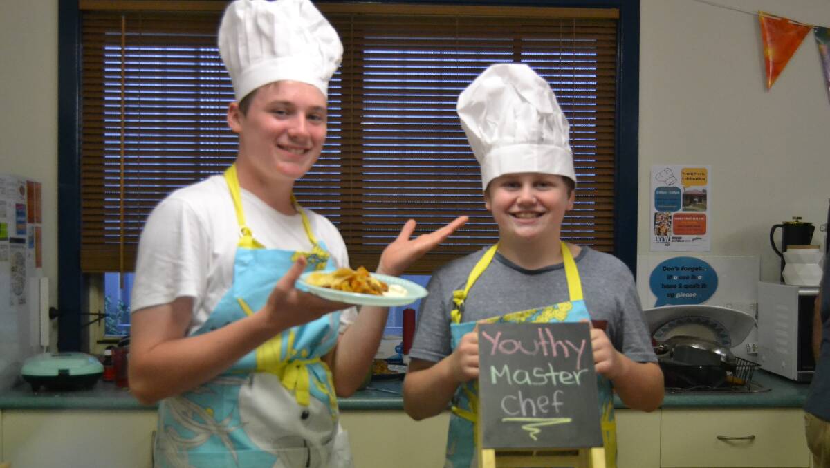 Riley and Noah were all smiles after they prepared nachos. 