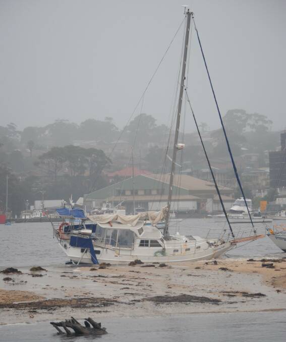 BEACHED AS: A yacht broke free from its anchor in Ulladulla Harbour over the weekend. Picture: Sam Strong.