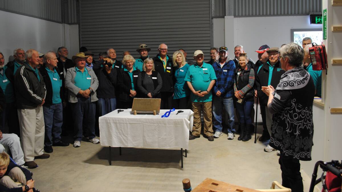 SPECIAL DAY: Milton Ulladulla Men's Shed members and supporters receive well wishes at the opening of their new shed.