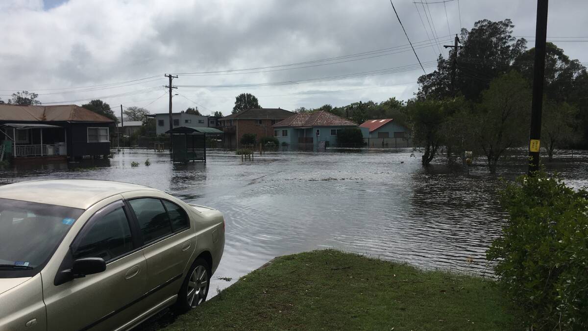 Waters continue to rise at Millham Street in Lake Conjola. Picture: Sam Strong.