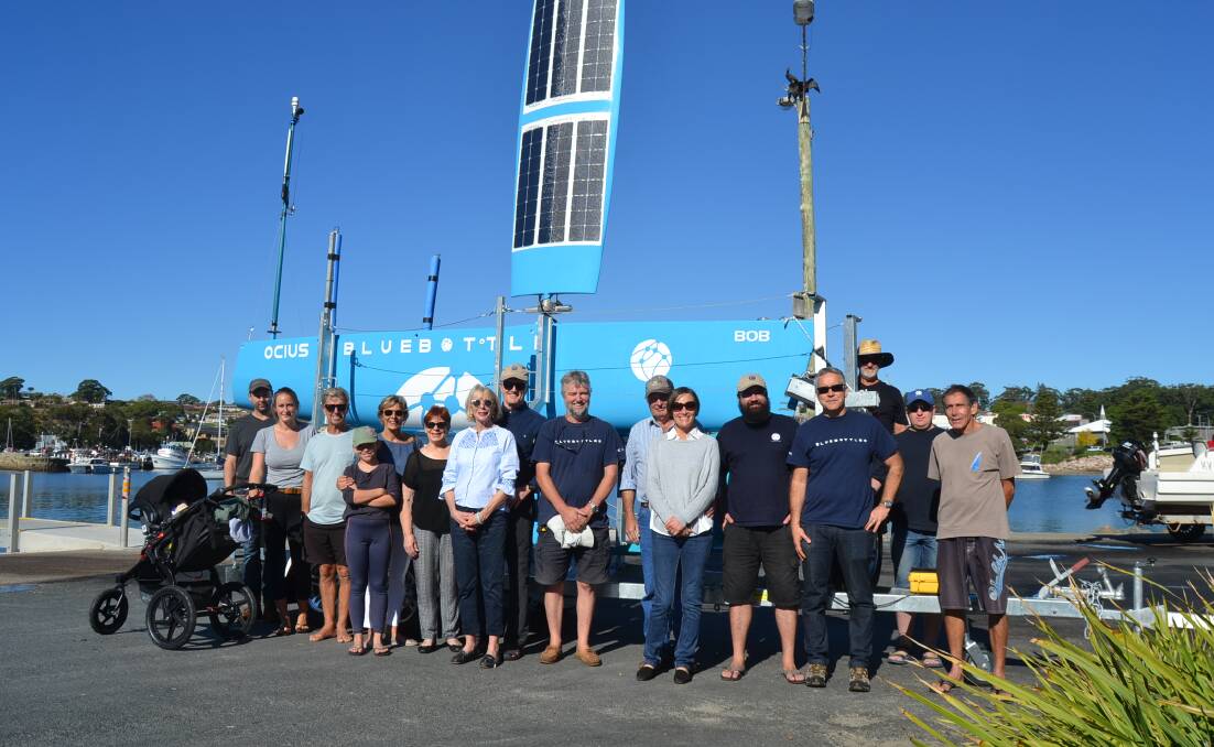 Bob, an OCIUS Technology bluebottle, with shareholders and staff.