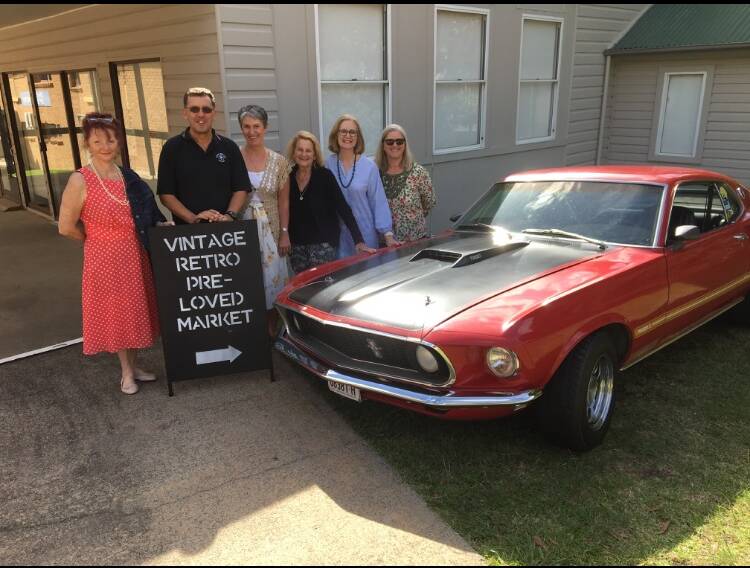 VINTAGE: Stallholders beside a 1969 Ford Mustang Mach 1 351 V8, one of many expected to be on show. Picture: supplied.