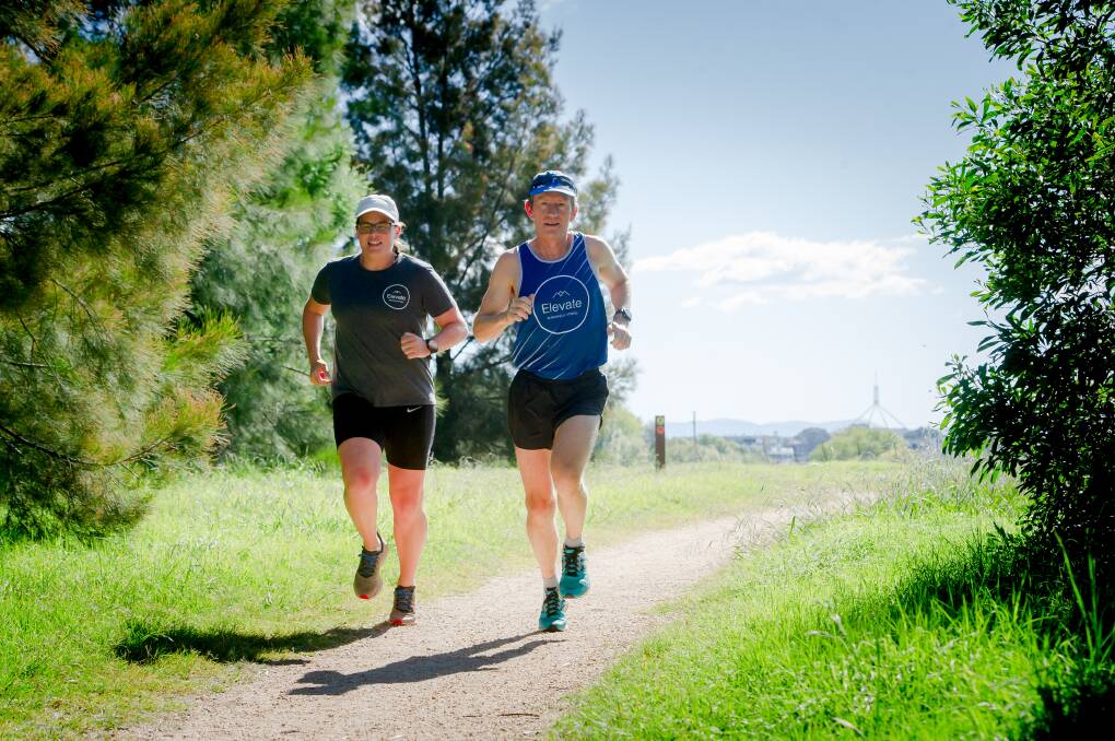 Ultra marathon runners, Laura Marshall and Martin Fryer agree there's no city like Canberra when it comes to the ease and accessibility of bush running trails. Picture: Elesa Kurtz 