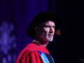 Craig Foster speaks at the UOW Faculty of Business and Law graduation ceremony on Tuesday, April 16. Picture by Sylvia Liber