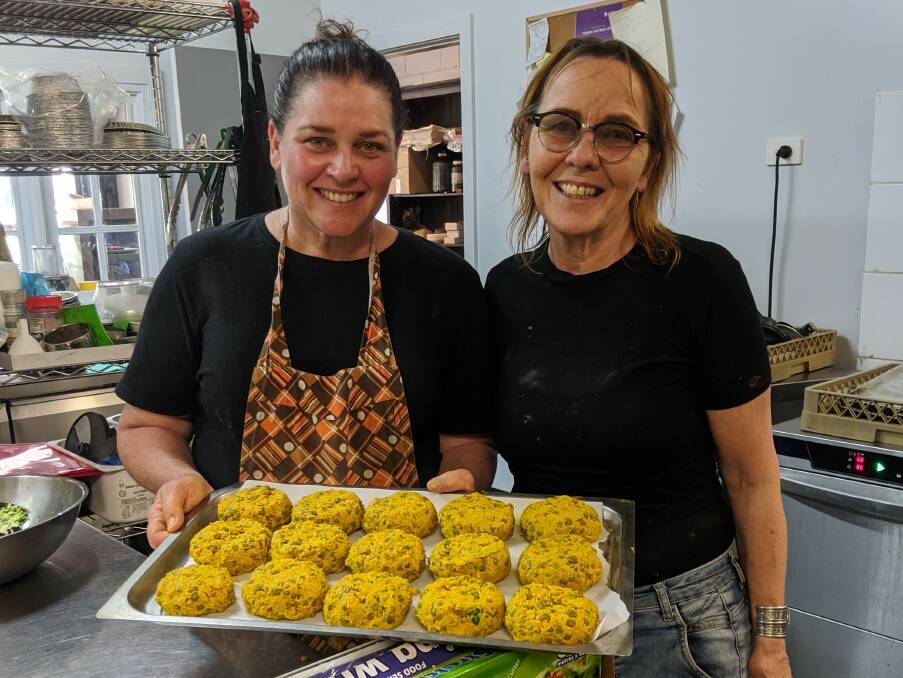 ADAPTATION: Karen Miller and Lucinda Dazos of Lucinda's Pantry at Robertson, NSW. Take away dinner supplies and home delivery are replacing the usual room full of coffee drinkers and locals who lunch.