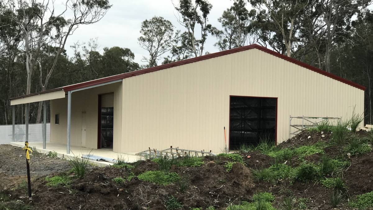 LOCKED AND LOADED: After five years of barbeques, fundraisers, raffles and endless hours of grant writing the Murramarang Men’s Shed has reached lock up stage. Image: supplied.
