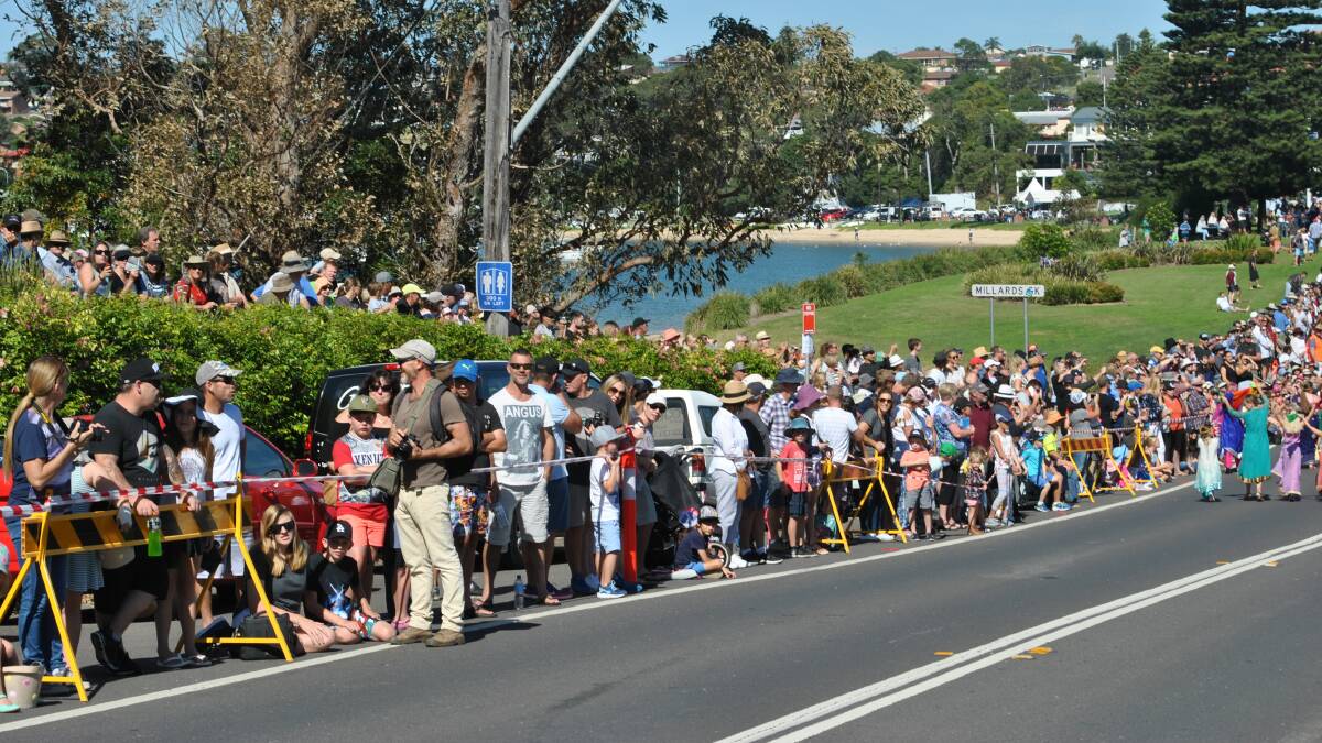 PACKED: Thousands line the Princes Highway at Ulladulla to watch to annual parade weave through town. Photo: Jessica McInerney. 