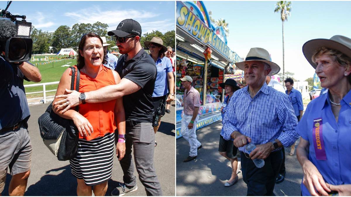 Labor's Fiona Phillips is removed by security after confronting Malcolm Turnbull during Friday's Nowra Show visit. Pictures: Adam McLean. 
