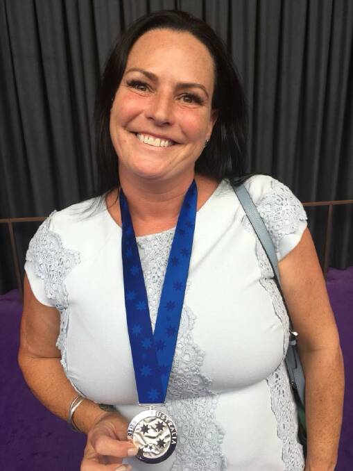 Lisa Elmas with her Pride of Australia medal at the presentation ceremony. Photo: supplied. 