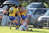 Warilla Lake South Gorillas players hug Dane Nelson after the winger scored one of his three tries against Milton-Ulladulla Bulldogs at Cec Glenholmes Oval on Sunday, April 21, 2024. Picture by Robert Peet