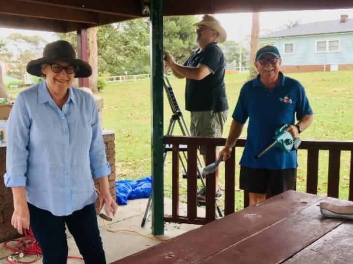 Rotary members Christine Bell, Steve Nicholas and Wayne Fry helping spruce up some of the facilities at Rotary Park recently, including the barbecue they'll fire up on December 13. Photo: rotaryclubofmiltonulladulla.org