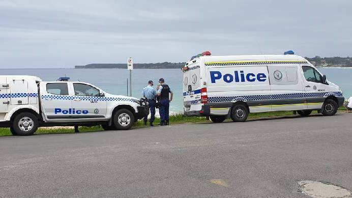 Police attend at Mollymook on Saturday after members of the public found human remains. Photo: TNV
