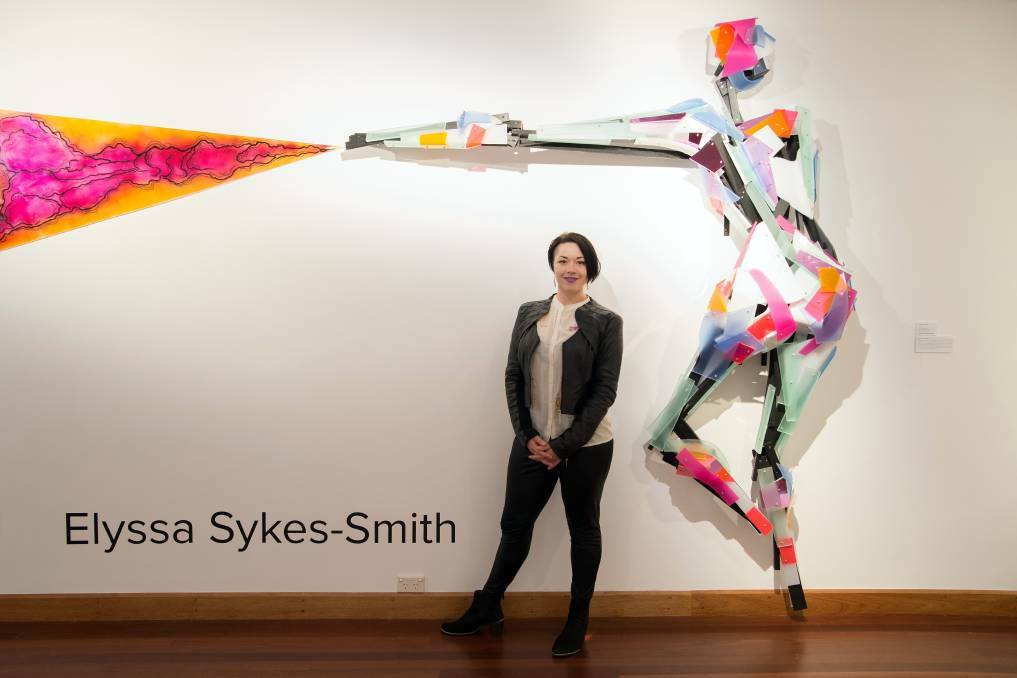 STUNNING: The festival will feature the work of Shoalhaven artist Elyssa Sykes-Smith who uses recycled wood to create climbing human figures. Picture: Colin Talbot