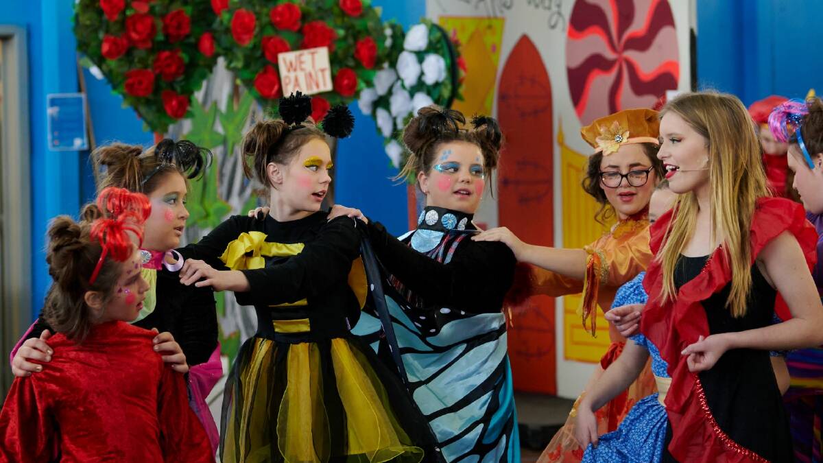 The region's talented young performers at the dress rehearsal for Alice in Wonderland recently. Grab your tickets now to the July 30 and 31 show. Image supplied. 