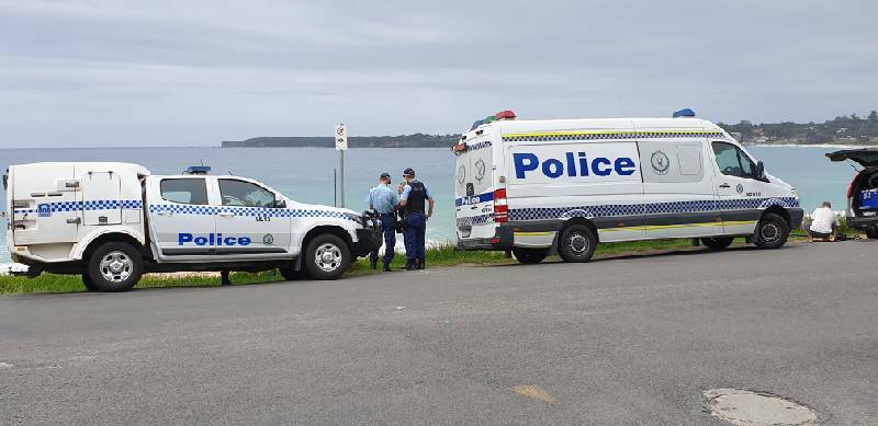 Police at the Mollymook beach where human remains were found on Friday, February 26. Image: TNV.