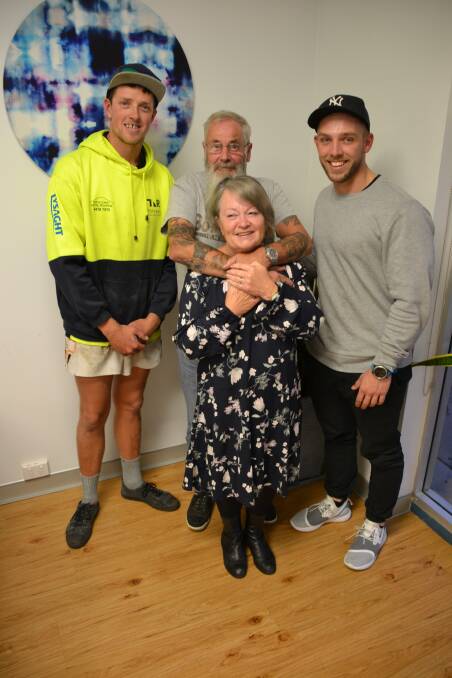 HAPPY DAYS: Chris Smithers and Ben Goodwin reunite with Cath and Alex Spence, who they swam to save from Lake Tabourie, after the Spence's car plunged off the Princes Highway.