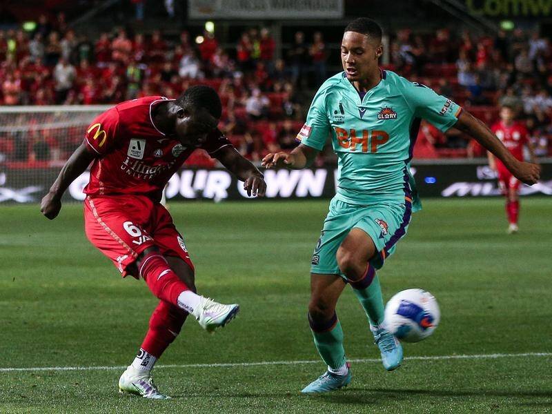 Nestory Irankunda fires the injury-time clincher in Adelaide United's 2-0 win over Perth Glory.