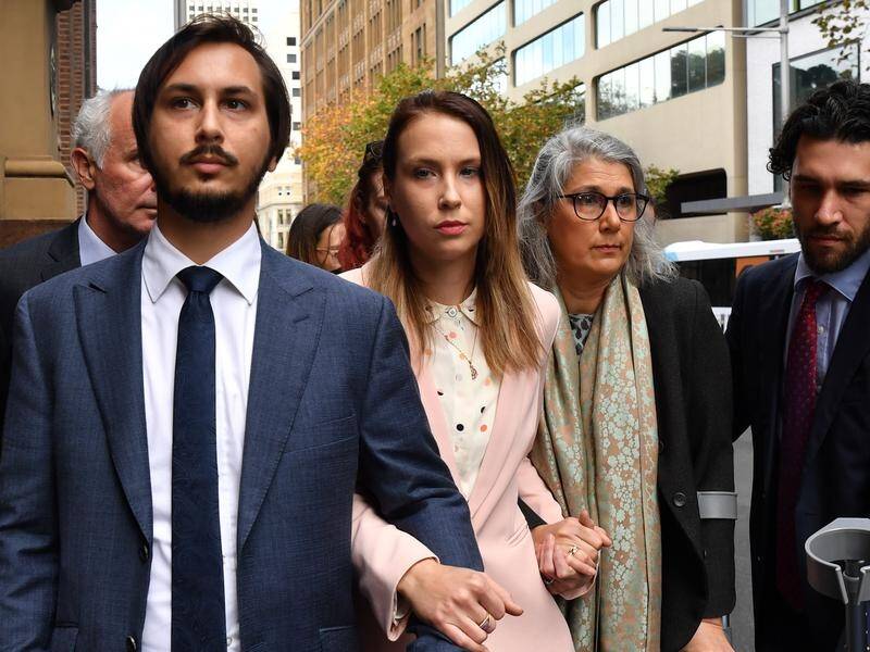 Hannah Quinn (second left) has avoided jail for being being an accessory after a sword killing.