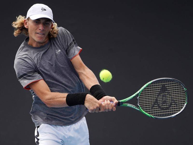 Max Purcell beat Jozef Kovalik in qualifying to earn a grand slam debut at the Australian Open.