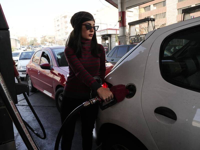 Iranian officials say services had been disrupted at about 70 per cent of Iran's petrol stations. (AP PHOTO)