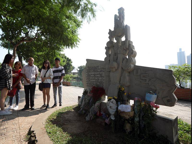 A statue commemorates US Senator John McCain near the lake where he was captured in Hanoi in 1967.