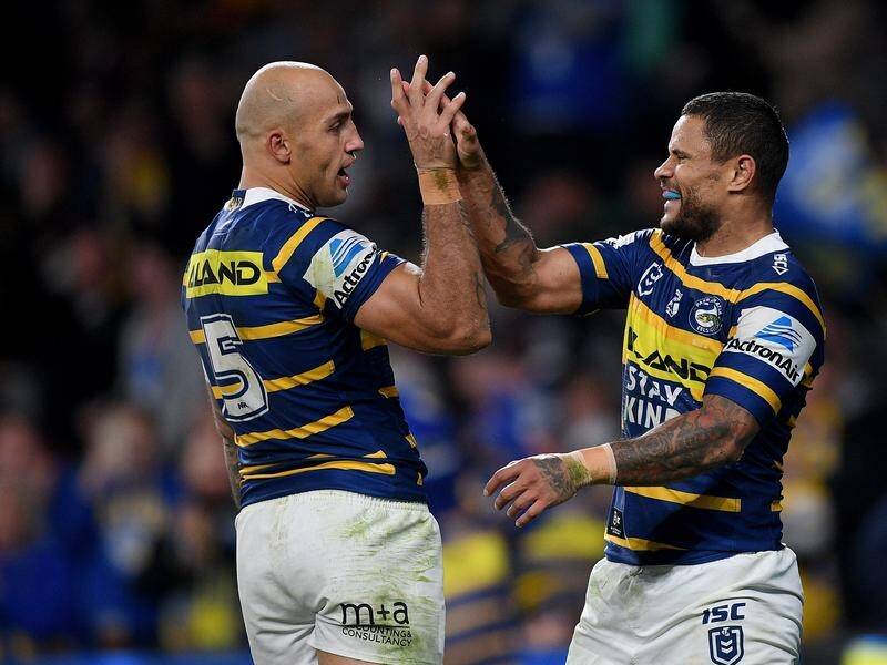 Parramatta's players and coach say winger Blake Ferguson (L) will deliver in his NSW Origin recall.
