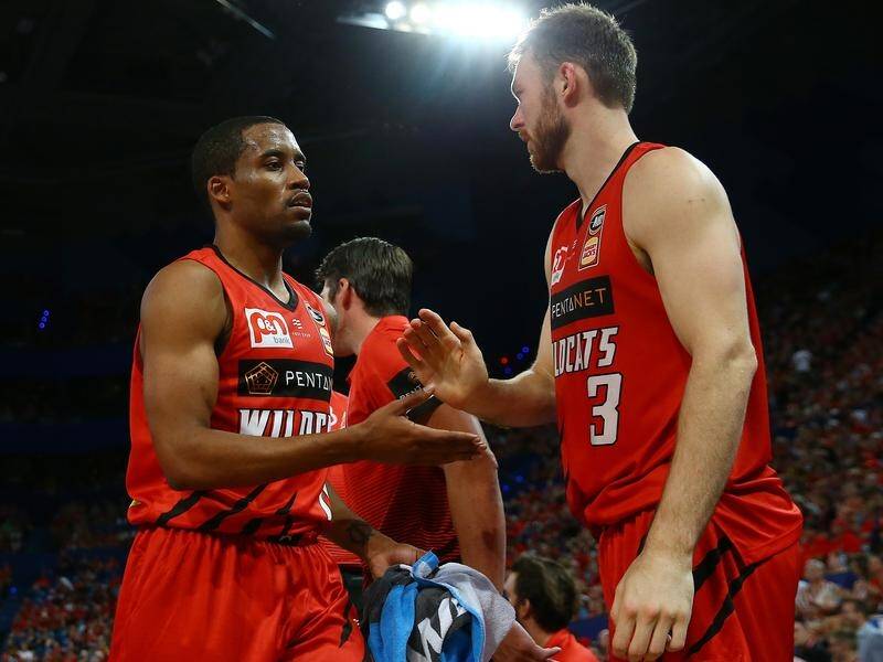 Bryce Cotton (L) bagged 25 points as the Perth Wildcats beat the Phoenix to go joint top of the NBL.