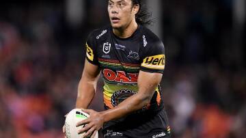 Jarome Luai of the Panthers looks to kick during the victory over North Queensland.