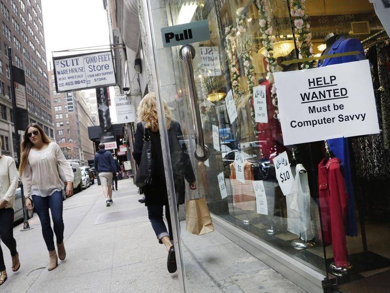 Non-farm payrolls increased by 199,000 jobs in November, US official data says. (AP PHOTO)