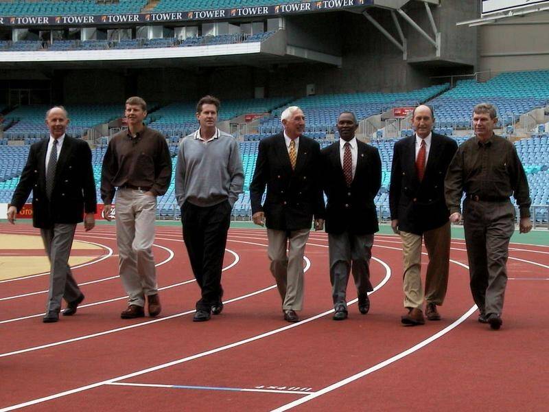 Peter Snell (right) pictured at Australia's Olympic Stadium with fellow "1500m Legends".