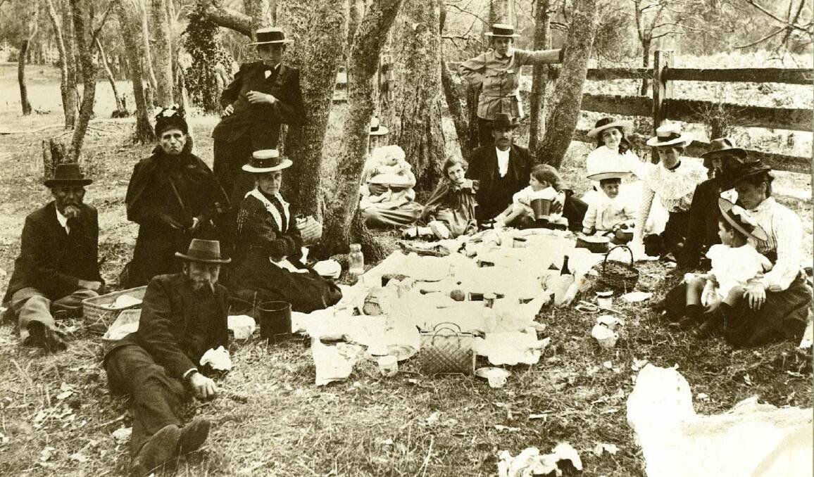 PICNIC TIME: Descendants of John Fisher Cambage gathered for a picnic in 1902, with young Arthur Koychen standing between two trees at the back. Also in the picture is his older brother Albert also leaning on trees, their mother Jane Koychen in front of Albert, Tom Cambage at the left of the picture, Emma Cambage next to him, and Prosper Cambage in front of them. 