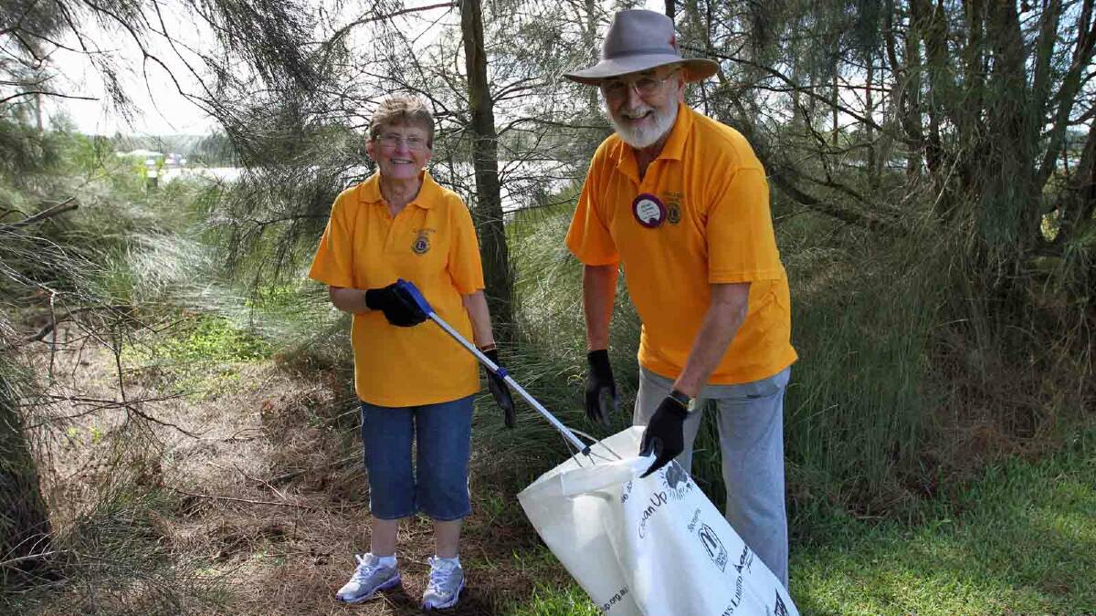 TRASHED: Getting among the rubbish for Clean Up Australia Day on Sunday were Colleen and Allan Green at the Lions Park in Burrill Lake.