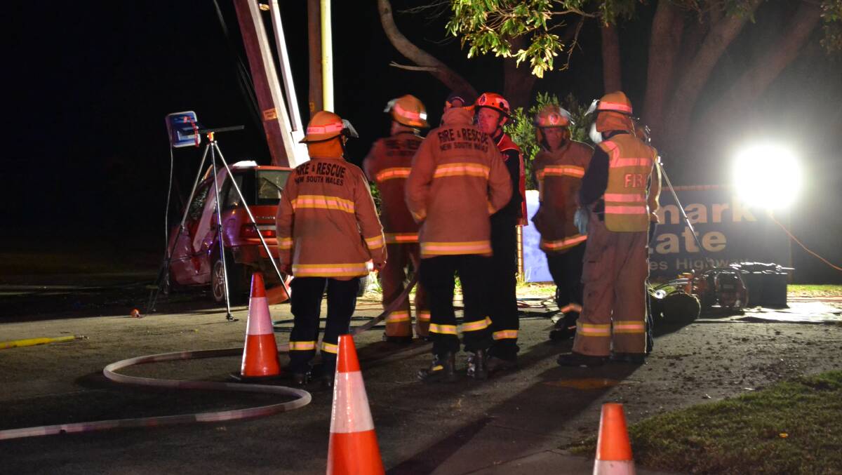 Fire and Rescue personnel on the scene of Monday night's fatal accident in Ulladulla