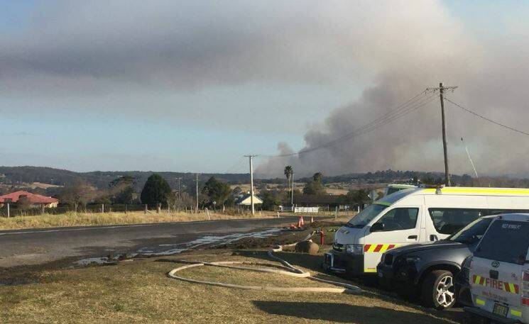 Fire tragedy: The plume of smoke from the scene of the fatal helicopter crash at the Kingiman fire near Ulladulla in August 2018. Picture: Emily Barton
