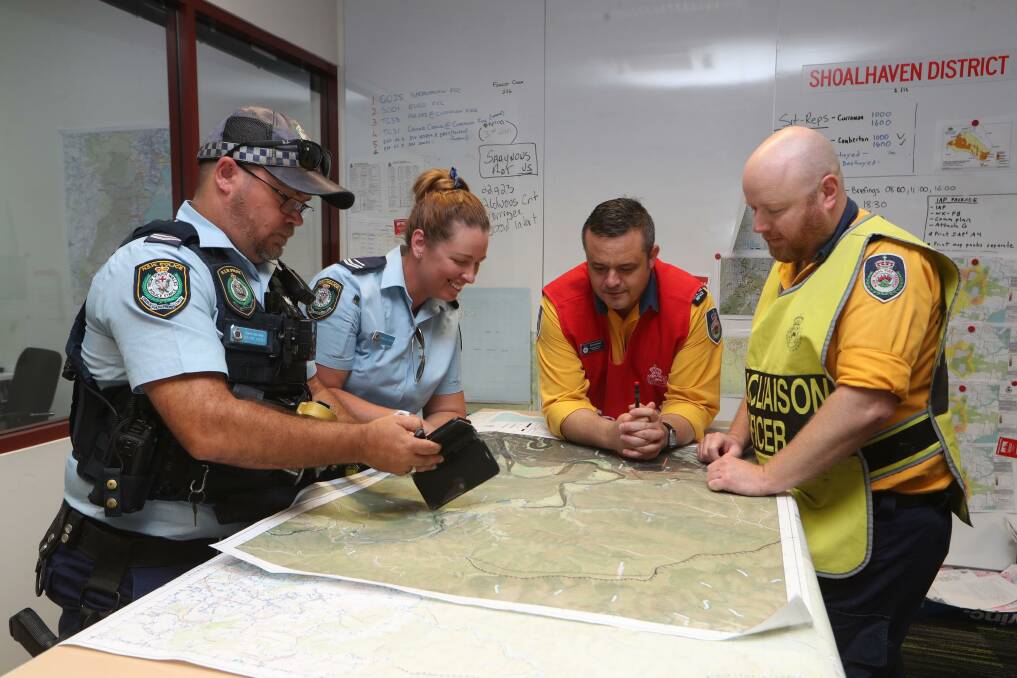 Several agencies planning together at the Shoalhaven Emergency Management Centre in Nowra. Photo: Sylvia Liber.