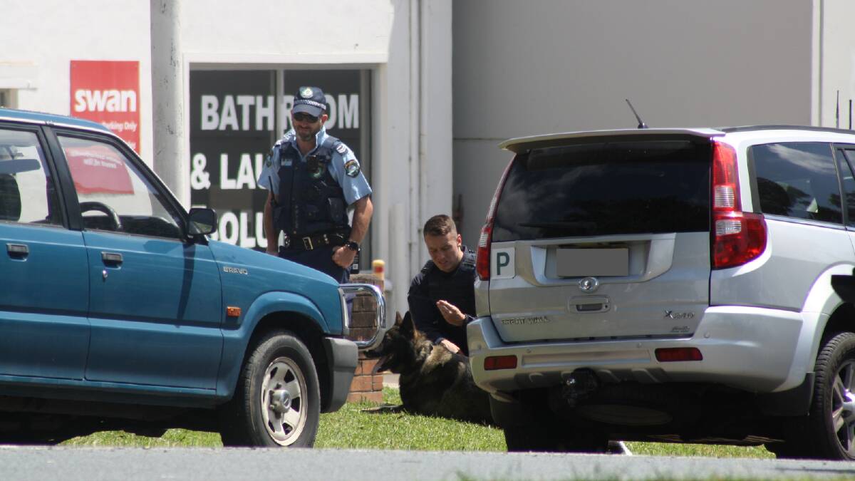 Police and tactical response officers during a standoff with a man allegedly armed with a knife in Kinghorne Street, Nowra on Thursday, February 1. Pictures by Glenn Ellard