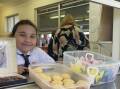 VOLUNTEER: Shiloh lends a helping hand at the Biggest Morning Tea.