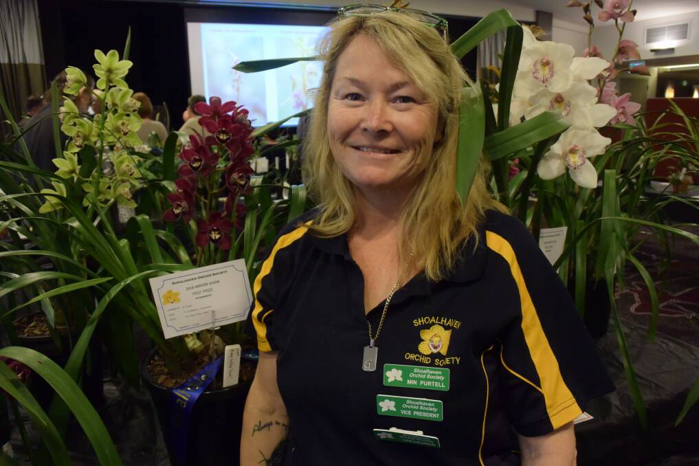 Min Purtell with her prizewinning orchids. File image
