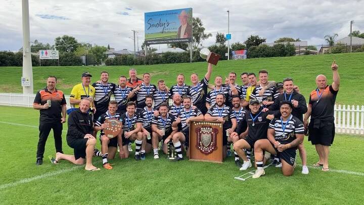  MacArthur Bulls Police Force Rugby League team celebrates. Image suppled 