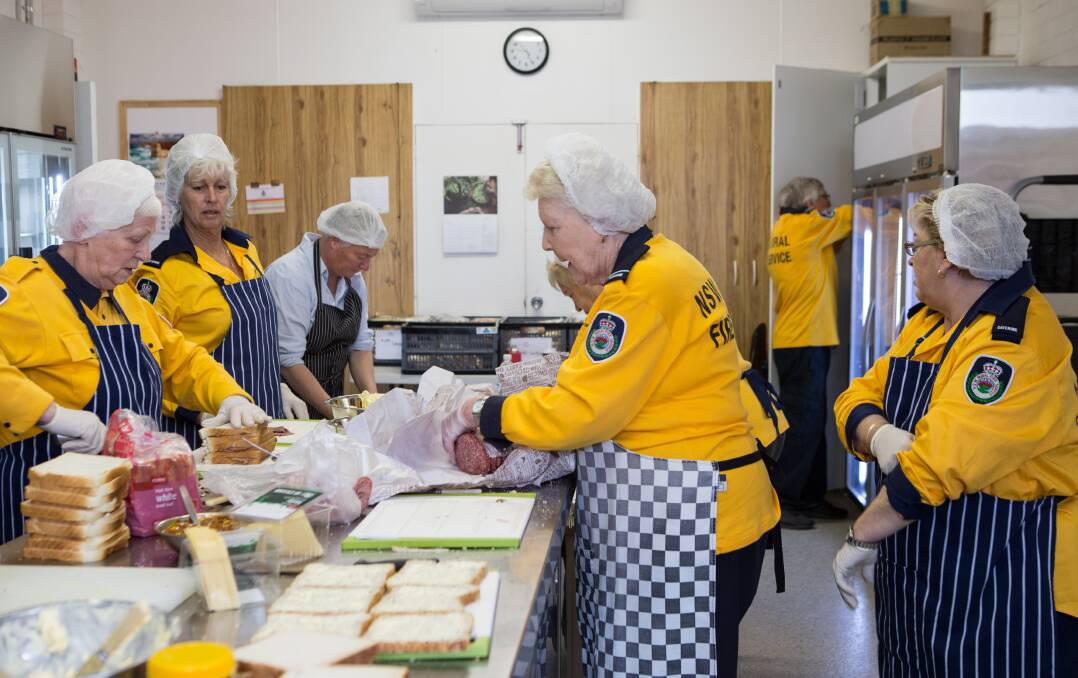The Shoalhaven Catering Brigade (NSW RFS Volunteers) produced 1500 sandwich packs on August 15 and averaged around 1000 sandwich packs per day in the following four days. Photo: Louise Whelan. 