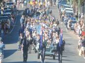 People lined the streets to clap and watch the veterans, school children, volunteer groups and members of the public march on Anzac Day.