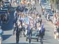People lined the streets to clap and watch the veterans, school children, volunteer groups and members of the public march on Anzac Day.