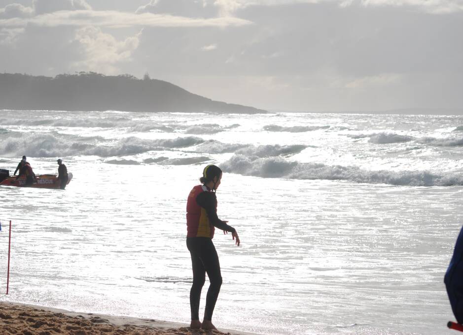 ELEMENTS: A storms brews and the waves crash at the recent IRB championships gets ready to compete. Send photos to damian.mcgill@austcommunitymedia.com.au