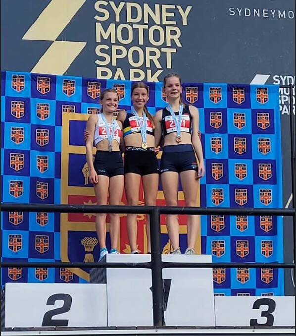 Nothing beats that winning feeling for Jessica Kann [middle]. Picture supplied 