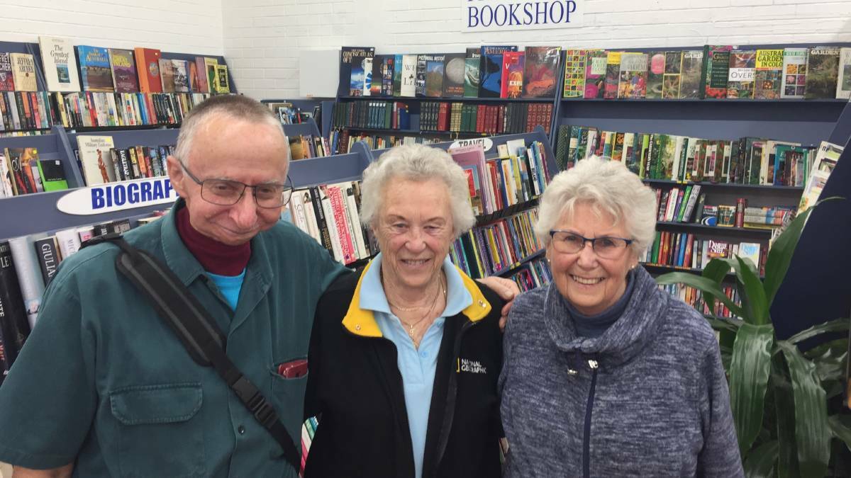 Former volunteer Kevin Oliver with Jann Wayland and Shirley Muller are happy to reopen the Lions Preloved Bookshop.