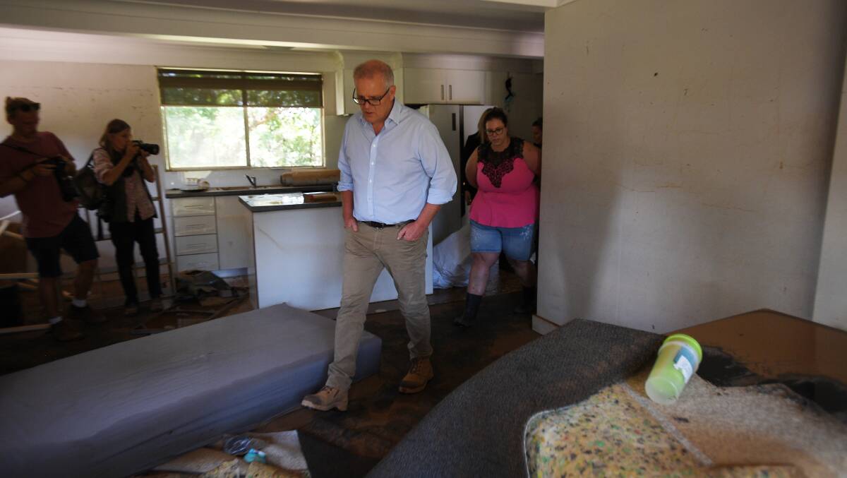Prime Minister Scott Morrison visits a flood affected property at McGraths Hill, Sydney. Picture: AAP