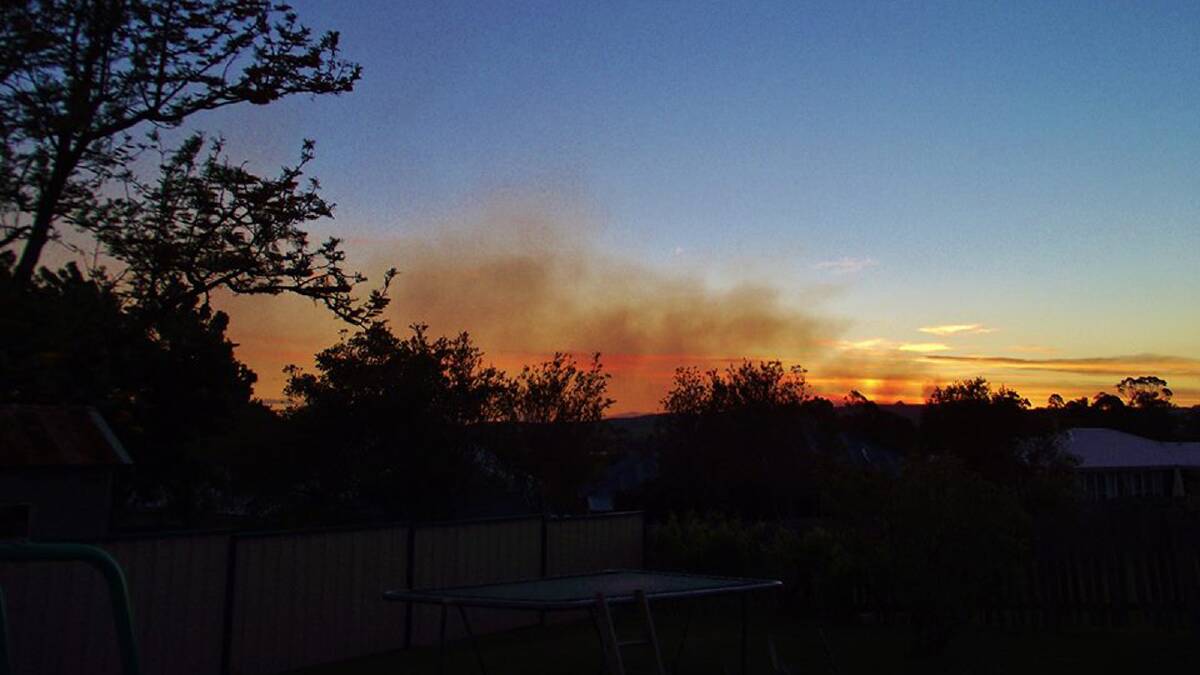 SPECTACULAR: The smoke haze from the fire burning in the Budawang National Park created a spectacular sight in Milton at sunset, with this image captured on Thursday night by Dannie and Matt Connolly.